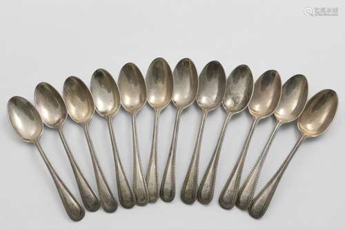 A SET OF TWELVE LATE VICTORIAN BEAD PATTERN TEA SPOONS initi...