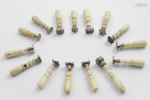 FIFTEEN VARIOUS SMALL VICTORIAN NICKEL-MOUNTED BONE SEALS wi...