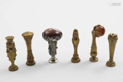 A COLLECTION OF SEALS FOUR LATE 19TH CENTURY BRASS SEALS wit...