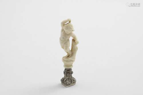 A VICTORIAN MOUNTED CARVED IVORY FIGURAL SEAL with a young b...