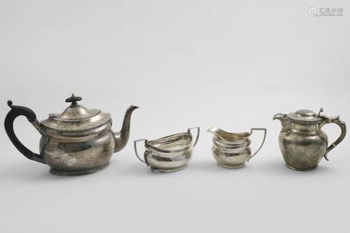 A GEORGE V THREE-PIECE OVAL TEA SET with flat bases, by Levi...