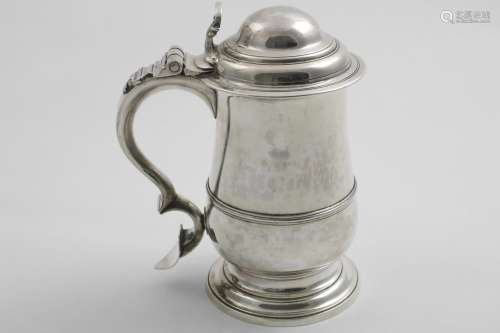 A GEORGE III BALUSTER TANKARD with an applied moulded girdle...