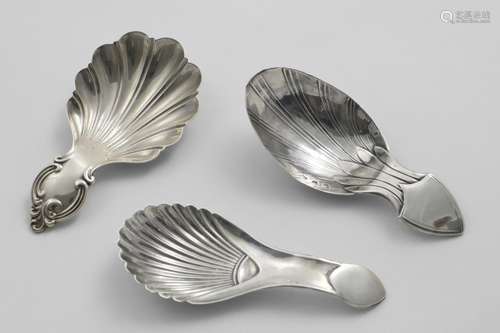 TWO SHEFFIELD-MADE CADDY SPOONS:- One with a shield cartouch...