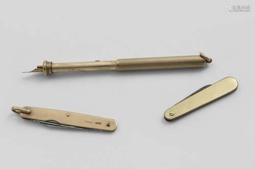 A GEORGE V 9 CT. GOLD TELESCOPIC PEN/PENCIL with slide actio...