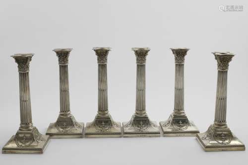 A SET OF SIX LATE VICTORIAN CANDLESTICKS with fluted columns...