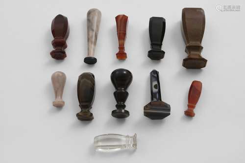 ELEVEN LATE 19TH CENTURY HARDSTONE SEALS most with engraved ...