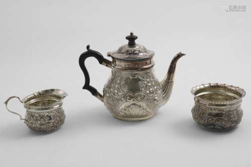 A SMALL, LATE VICTORIAN THREE-PIECE TEA SET with embossed de...