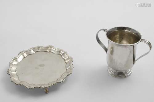 A GEORGE III SMALL TWO-HANDLED CUP with a baluster body and ...