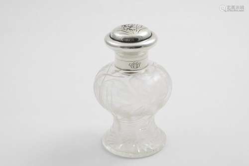 AN EDWARDIAN ART NOUVEAU-MOUNTED GLASS TOILET BOTTLE with a ...