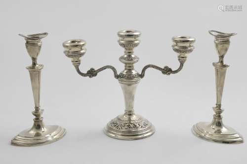 A PAIR OF EDWARDIAN CANDLESTICKS on navette-shaped bases wit...