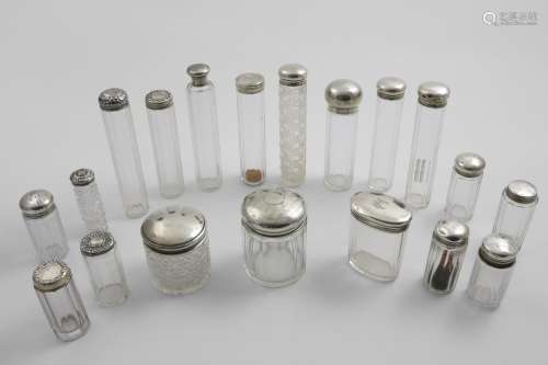 NINETEEN VARIOUS MOUNTED CUT-GLASS TOILET BOTTLES/JARS of mi...