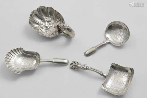 FOUR CADDY SPOONS with hollow stems: a Victorian example wit...