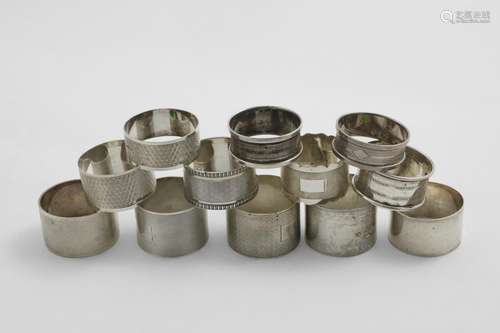 TWELVE VARIOUS NAPKIN RINGS all without initials or dedicati...