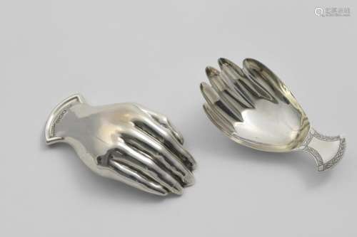 A GEORGE III NOVELTY CADDY SPOON in the form of a right hand...