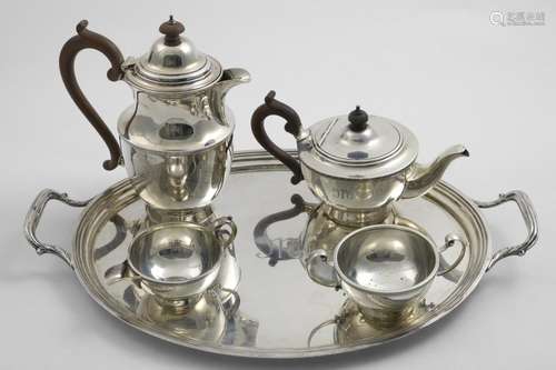 A GEORGE V FOUR-PIECE TEA SET AND TRAY the vessels with circ...