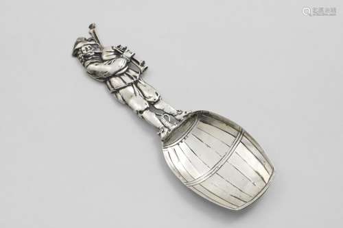 A CONTINENTAL NOVELTY CADDY SPOON in the form of a bagpiper ...