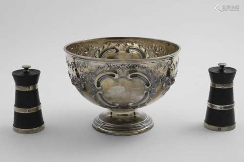 AN EDWARDIAN CIRCULAR ROSE BOWL with embossed decoration and...
