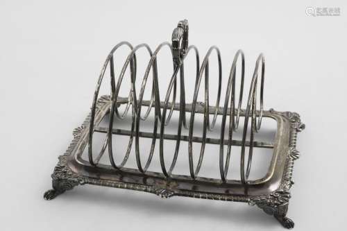 A GEORGE III RECTANGULAR TOAST RACK with arched wire bars, a...