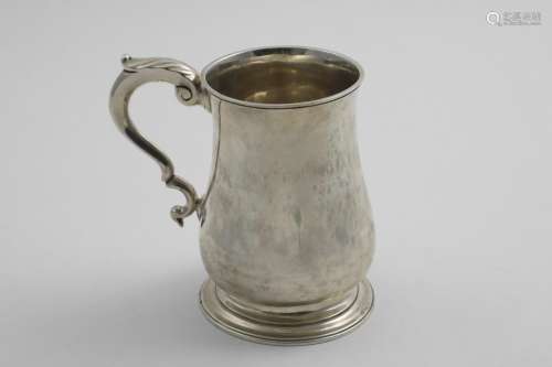 CHANNEL ISLES:- A late 18th century mug of baluster form on ...