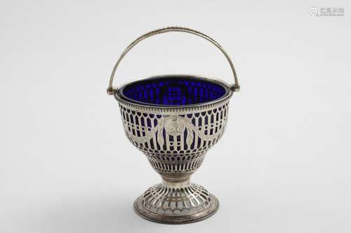 A GEORGE III SWING-HANDLED SUGAR BASKET with pierced and eng...