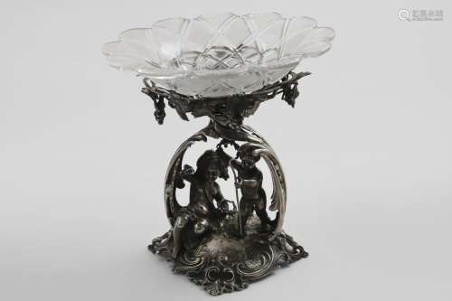 A VICTORIAN MATCHED DESSERT STAND in the form of two putti i...