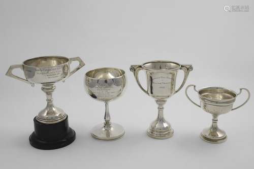 GOLFING TROPHIES:- A trophy goblet, inscribed 