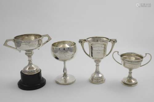 GOLFING TROPHIES:- A trophy goblet, inscribed 