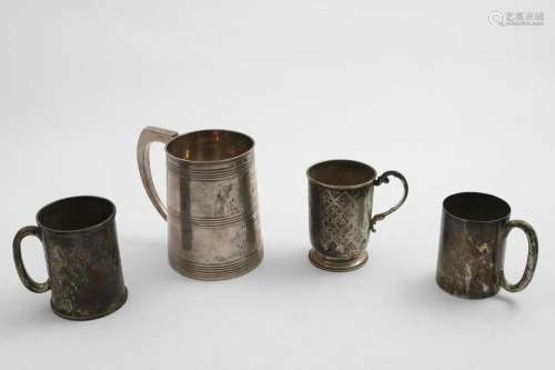 A GEORGE III TAPERING MUG with bands of applied reeding and ...