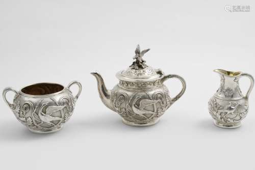 A LATE VICTORIAN BACHELOR'S THREE-PIECE TEA SET with globula...