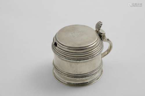 A VICTORIAN MUSTARD POT resembling a squat tankard with an u...