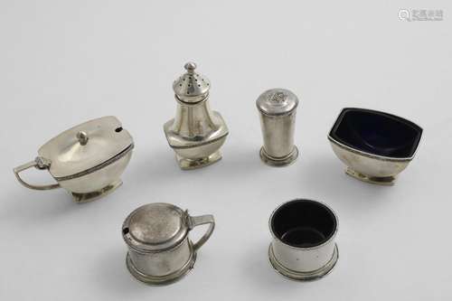 AN ELIZABETH II HANDMADE THREE-PIECE CONDIMENT SET with a ha...