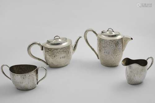 AN EDWARDIAN NATURALISTIC FOUR-PIECE TEA SET the oval bodies...