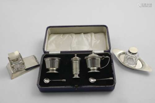 AN ART DECO CASED THREE-PIECE CONDIMENT SET with two spoons ...