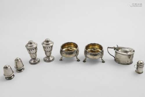 CONDIMENTS:- A pair of Edwardian pierced pepperettes, blue g...