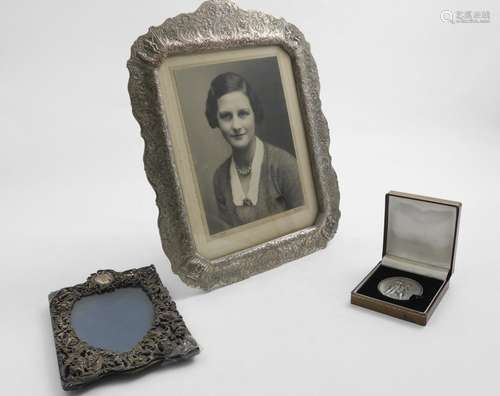 A SMALL VICTORIAN PHOTOGRAPH FRAME with a heart-shaped windo...