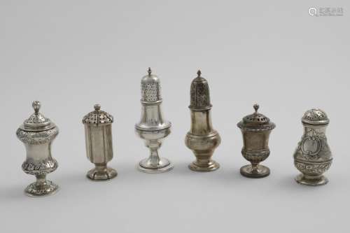 SIX VARIOUS ANTIQUE PEPPER CASTERS to include an Indian colo...