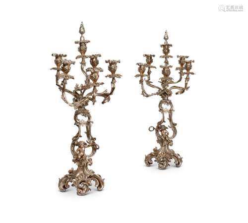 A PAIR OF SILVERED SIX BRANCH CANDELABRA