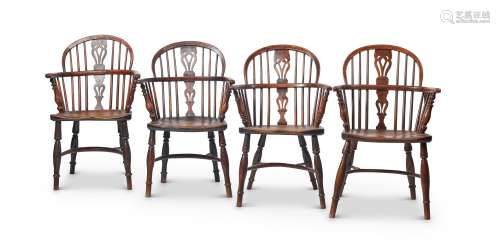 A HARLEQUIN SET OF EIGHT YEW AND ELM LOW BACK WINDSOR CHAIRS