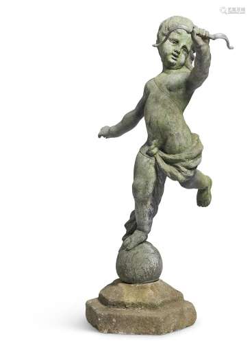 A LEAD AND COMPOSITION GARDEN FIGURE OF A CUPID