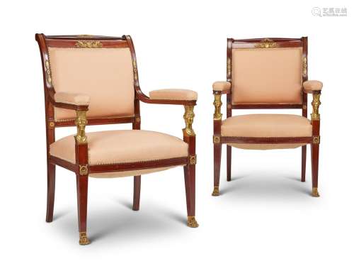 A PAIR OF FRENCH MAHOGANY AND ORMOLU MOUNTED OPEN ARMCHAIRS