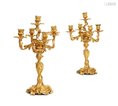 A PAIR OF ORMOLU FIVE BRANCH CANDELABRA