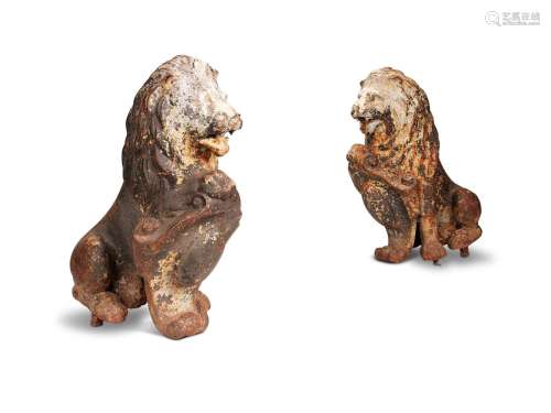 A PAIR OF CAST IRON HERALDIC LIONS, LATE 19TH CENTURY