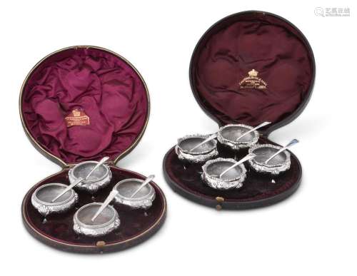 TWO MATCHED SETS OF FOUR VICTORIAN SILVER CAULDRON SALT CELL...
