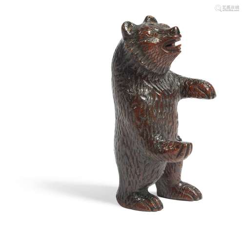 A BLACK FOREST TYPE FIGURE OF A STANDING BEAR