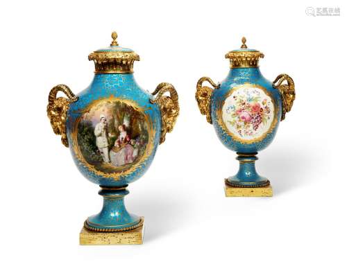 A PAIR OF FRENCH SÈVRES STYLE ORMOLU MOUNTED VASES AND COVER...