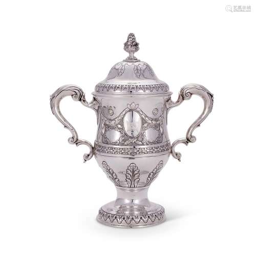 A GEORGE III IRISH SILVER OGEE TWIN HANDLED CUP AND COVER BY...