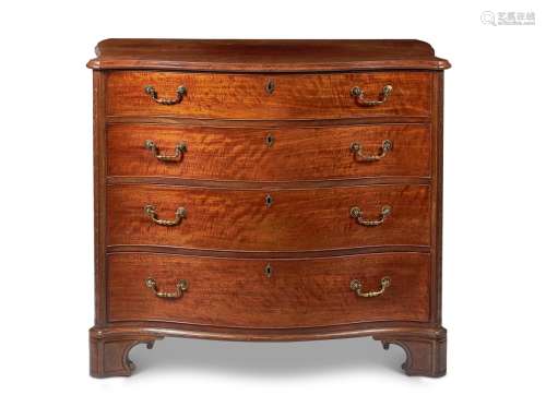 A GEORGE III MAHOGANY SERPENTINE COMMODE, IN THE MANNER OF T...