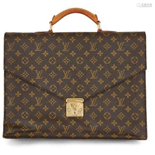 Un attaché-case monogramme Louis Vuitton, avec sangle en cui...