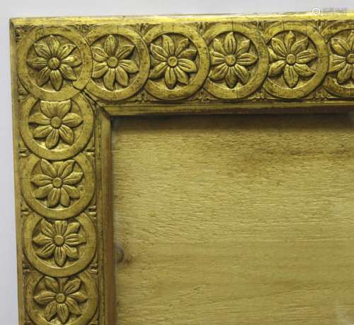 AN `AESTHETIC PERIOD` GILT PICTURE FRAME the border with ove...