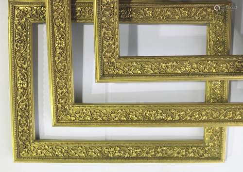 A TRIO OF GILT METAL FRAMES each with pierced, leafy vine de...